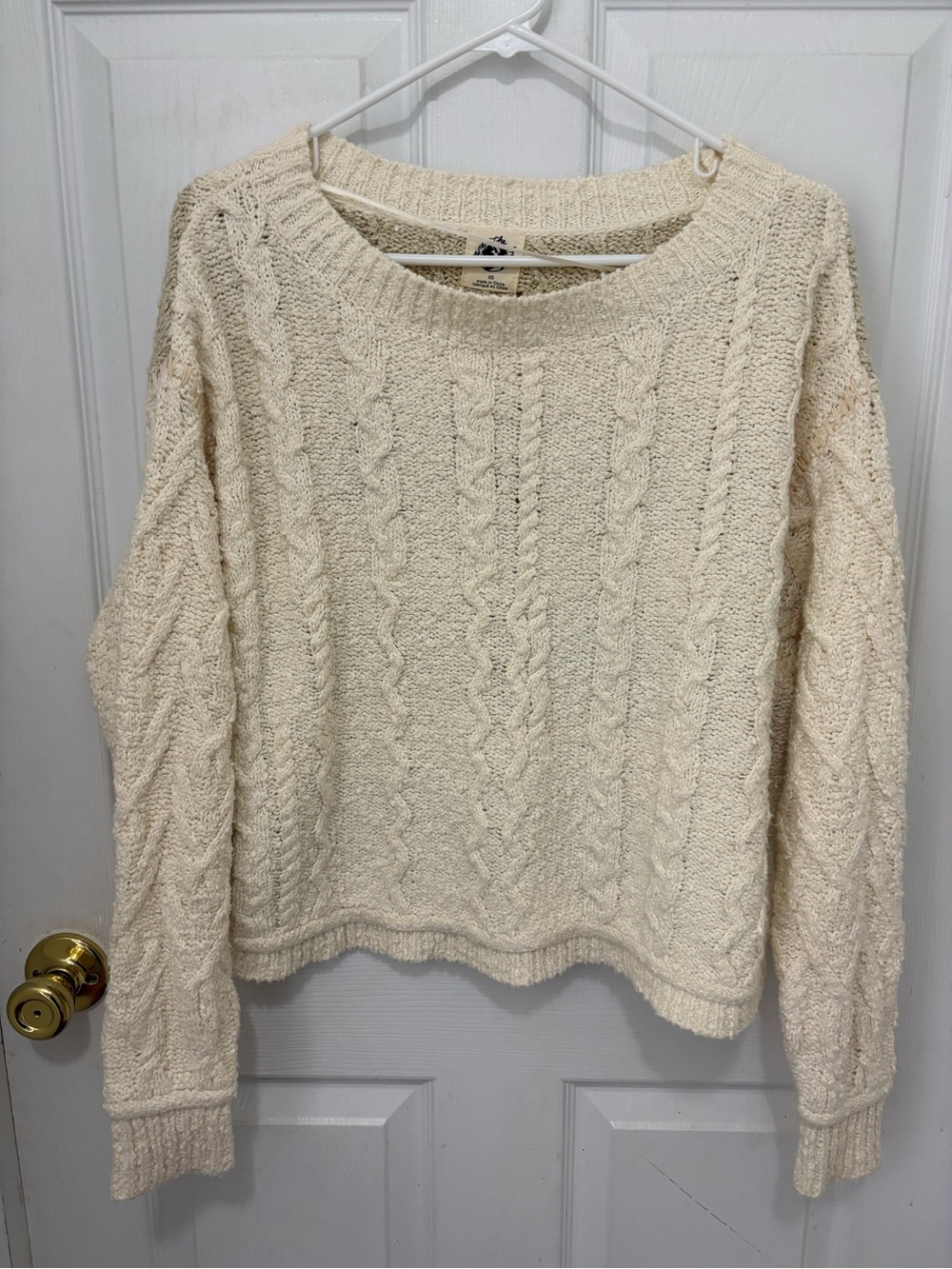 We The Free Cream and Black oversized cable knit sweater